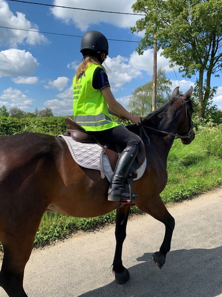 Young Person riding horse